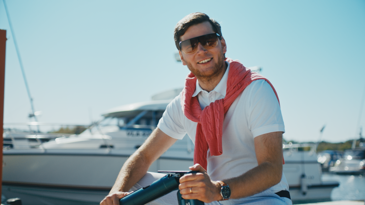 men, one person, outdoors, adult, lifestyles, males, sport, smiling, yacht, nautical vessel, sailing, leisure activity, summer, caucasian ethnicity, sunglasses, recreational pursuit, one, man, happiness, healthy lifestyle